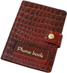 Телефонная записная книга карманная с вырубным алфавитом в переплете из натуральной кожи вишневого цвета с кнопкой